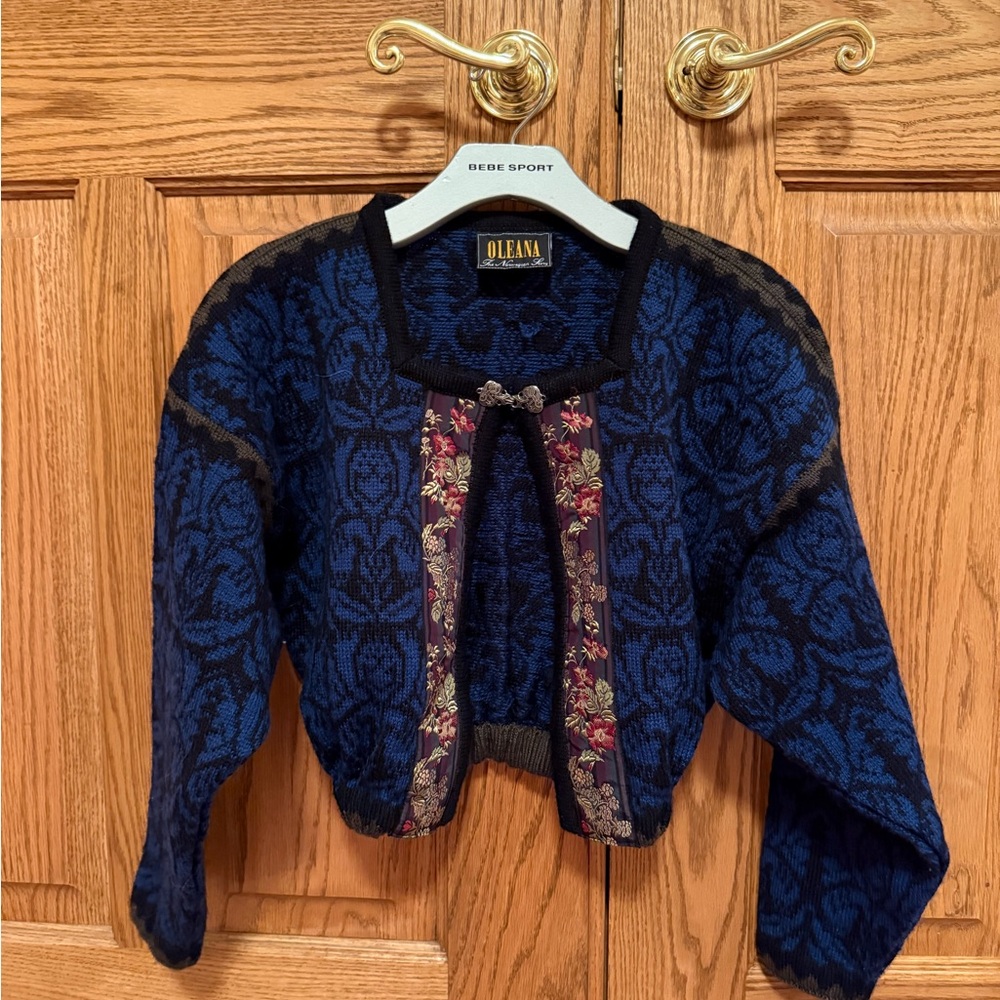 Vintage Oleana  the Norwegian story.  royal blue and black sweater